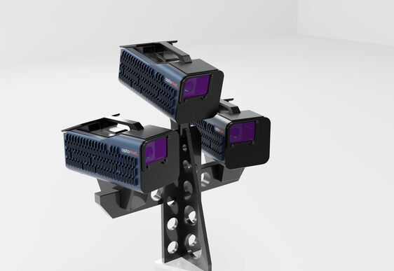 Three scanning vibrometers mounted together on a stand, forming an integrated 3D scanning system.