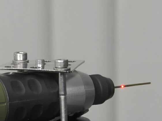 Single-point Laser Doppler Vibrometer measuring a rotating drill; the laser beam is aligned with the tool surface.